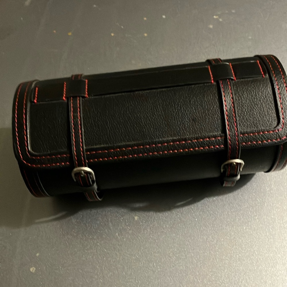 Watch holder. Holds 3 watches